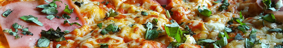 Eating Pizza at Rocco's Pizza restaurant in Cottage Grove, MN.